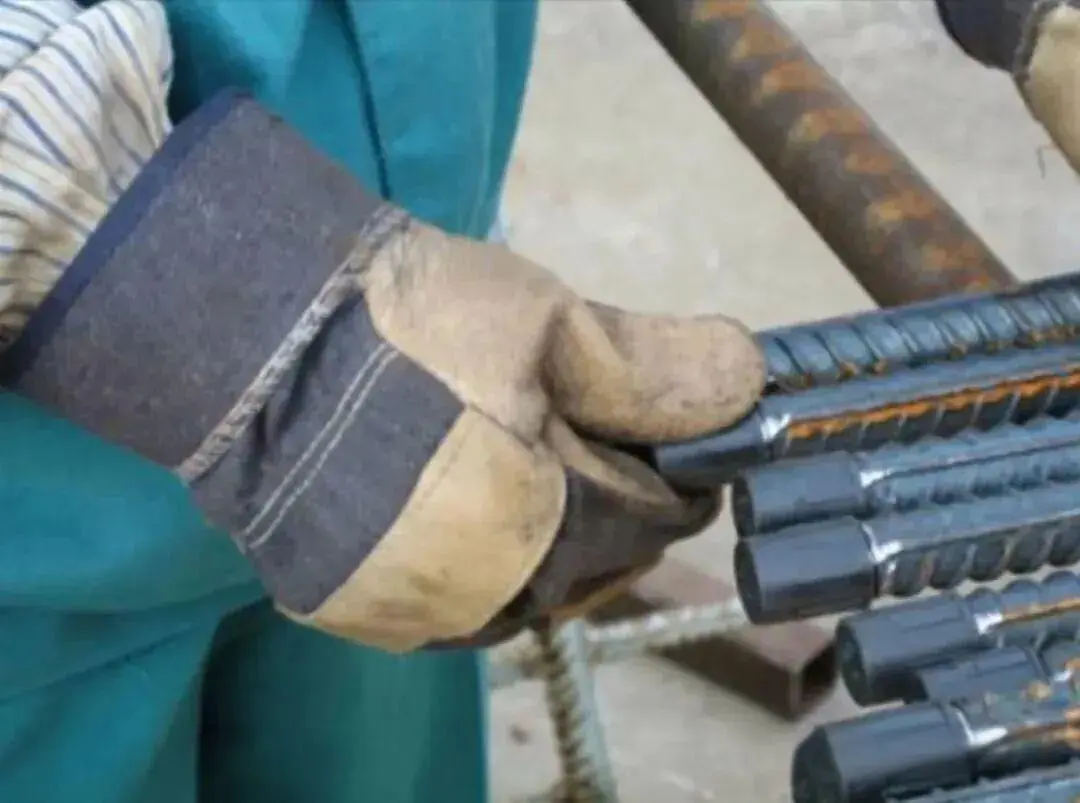 Fitting protective sleeves to rebar threaded ends