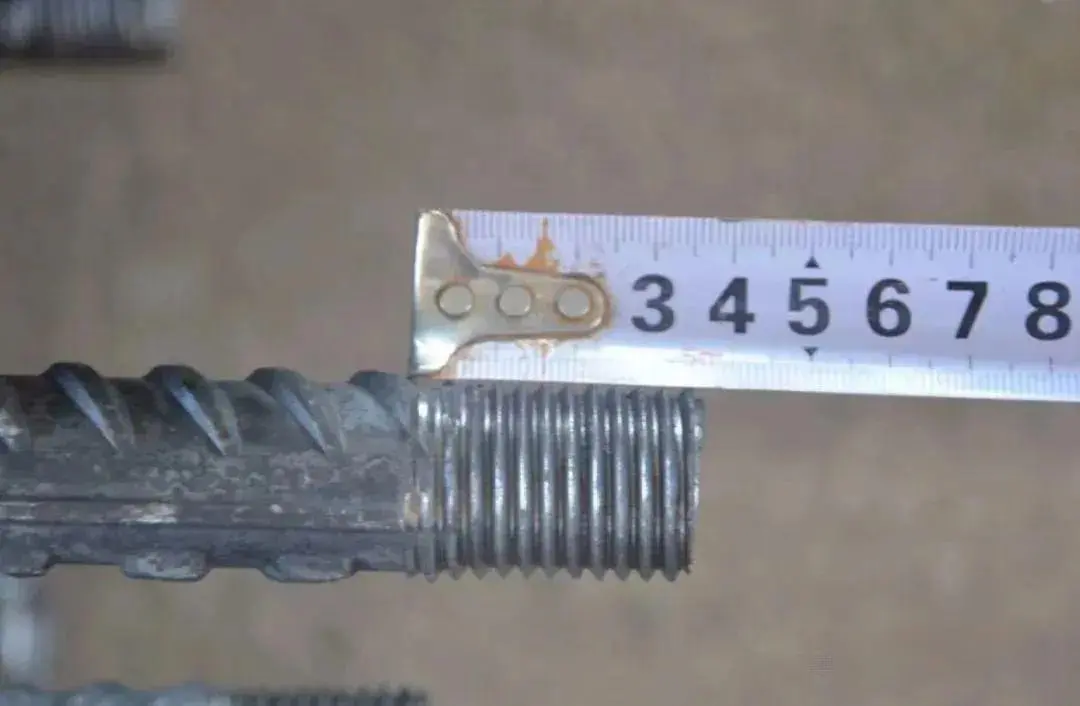 Measure the length of the threaded section of the reinforcing bar